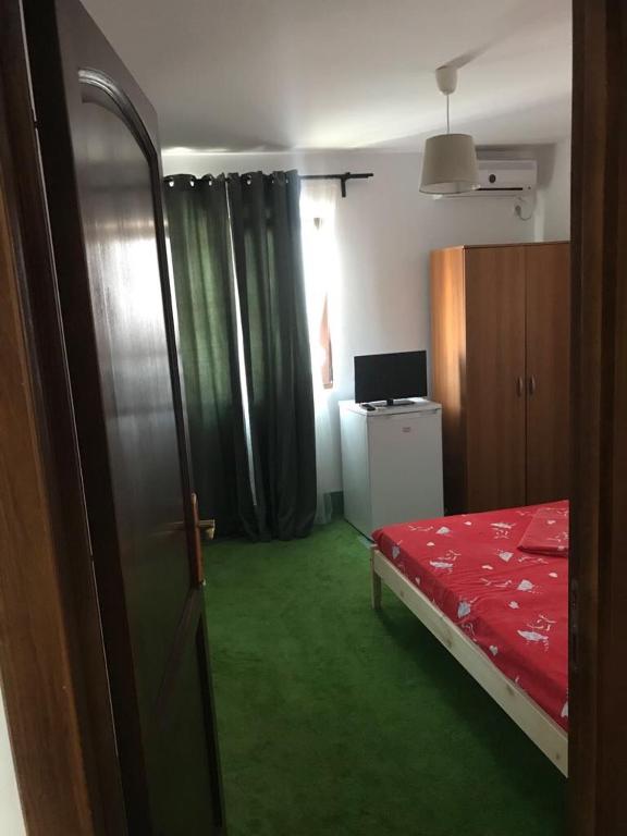 Postel nebo postele na pokoji v ubytování Vila ALBA AREAL