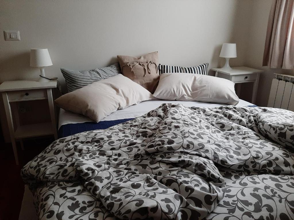 Posteľ alebo postele v izbe v ubytovaní cà bianca