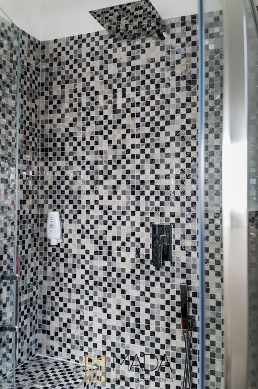 Kúpeľňa v ubytovaní MADA Charm Apartments Jacuzzi
