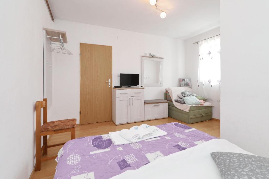 Posteľ alebo postele v izbe v ubytovaní Apartment Bilberry