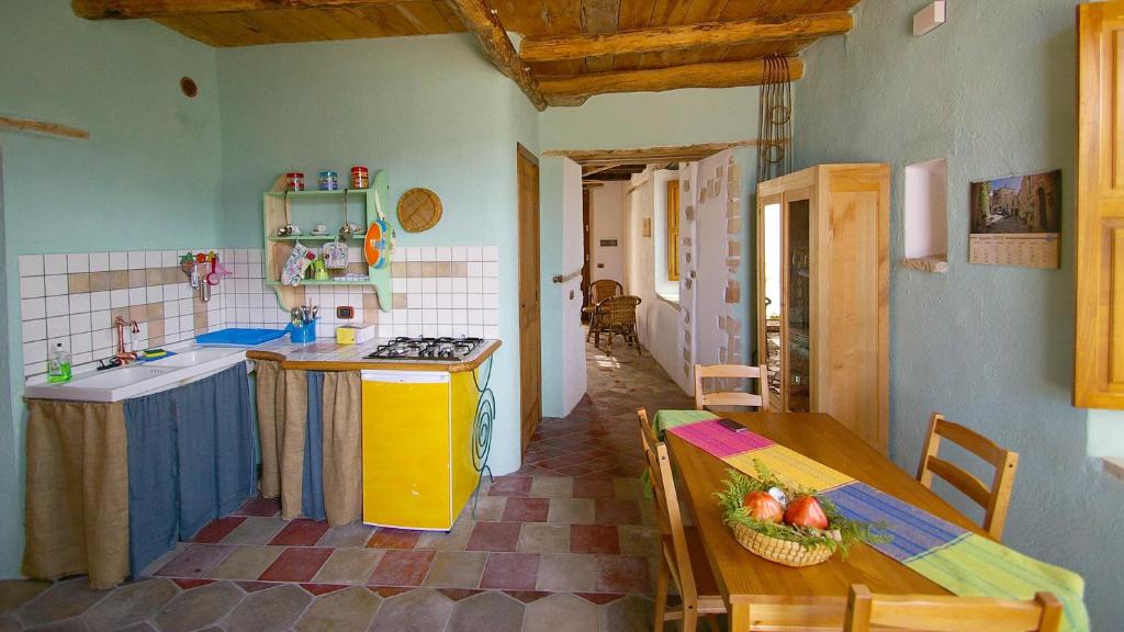 Kuchyň nebo kuchyňský kout v ubytování Albergo diffuso Ecobelmonte