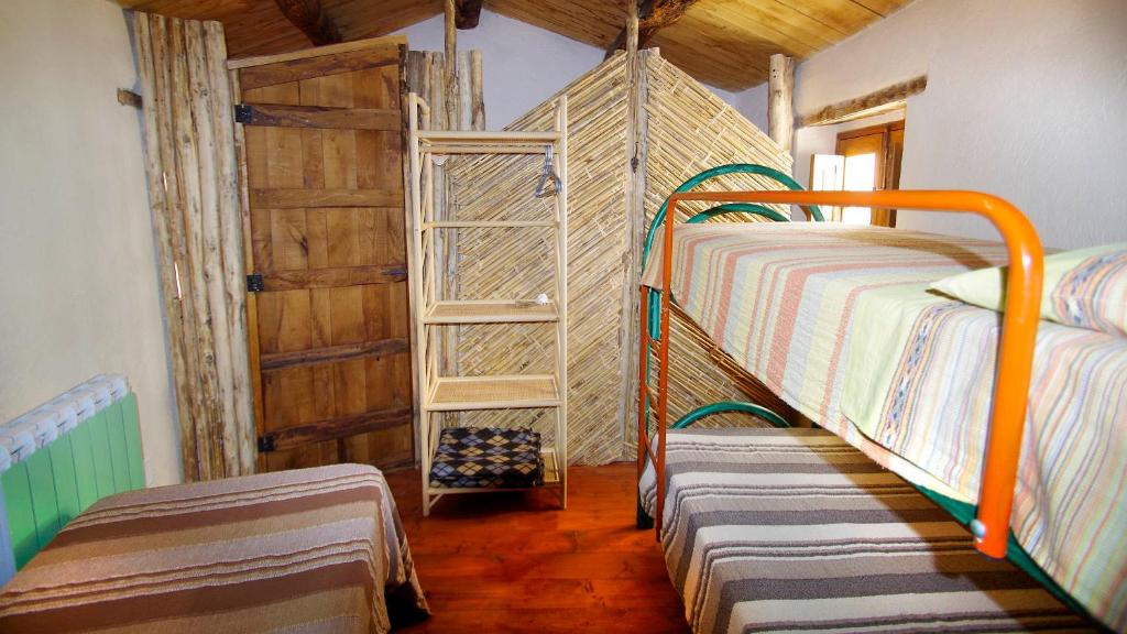 Postel nebo postele na pokoji v ubytování Albergo diffuso Ecobelmonte
