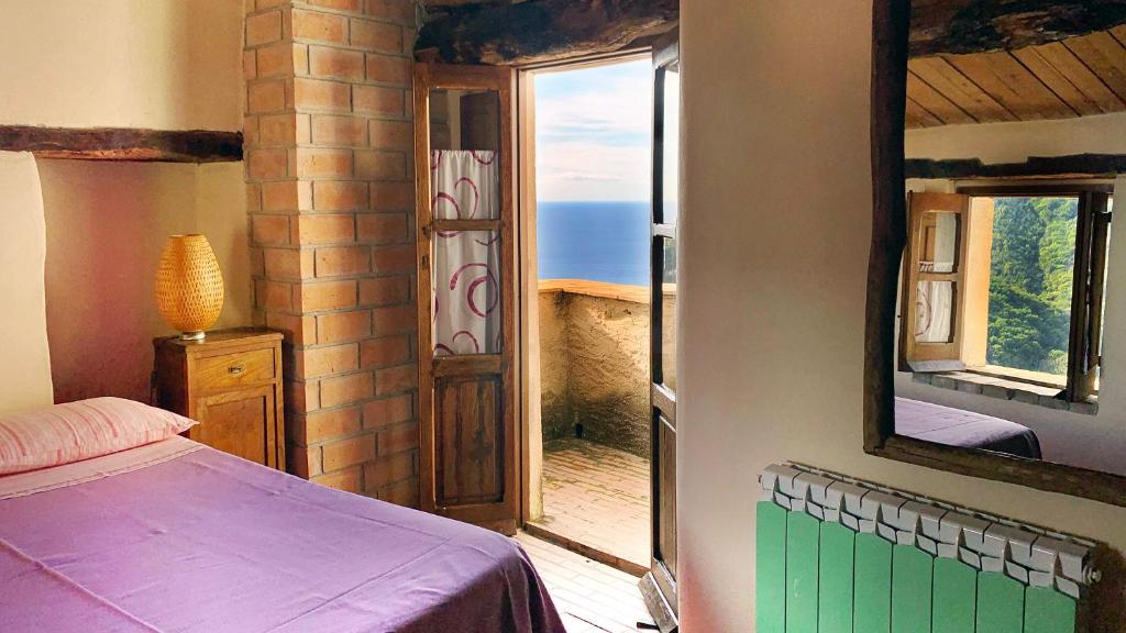 Postel nebo postele na pokoji v ubytování Albergo diffuso Ecobelmonte