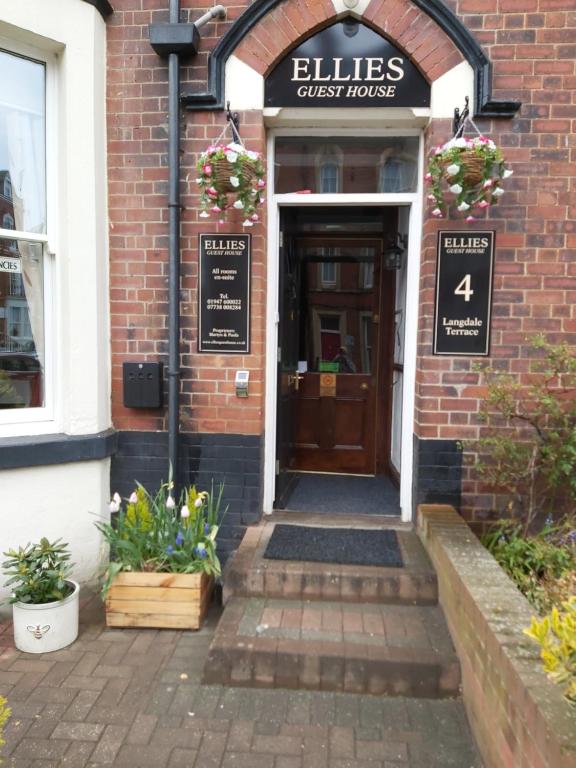 a front door of a brick building with a guest house at Ellies Guest House in Whitby