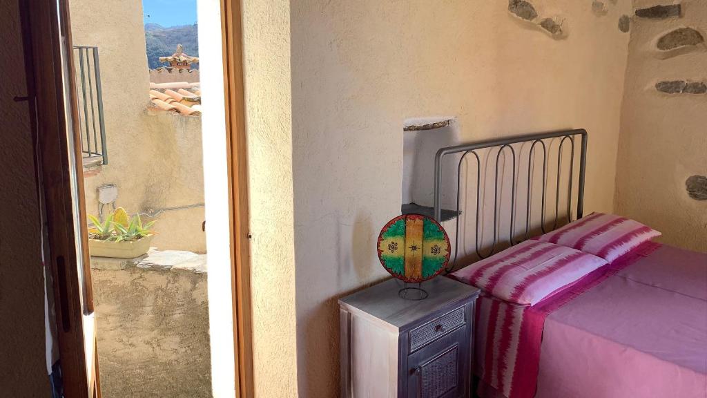 Postel nebo postele na pokoji v ubytování Albergo diffuso Ecobelmonte