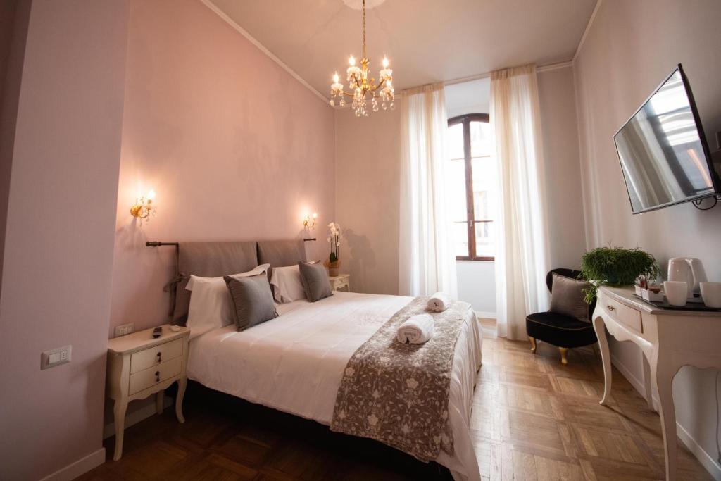 Posteľ alebo postele v izbe v ubytovaní B&B Dimora Sassetti 6