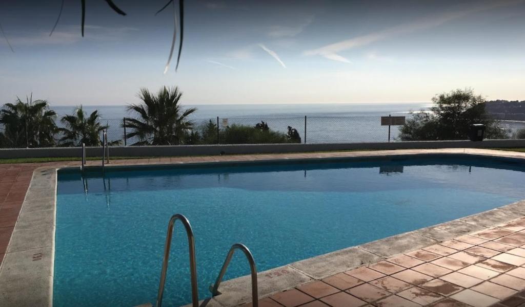Bazén v ubytování Casa Mediterráneo Tropical. El mar a tus pies nebo v jeho okolí