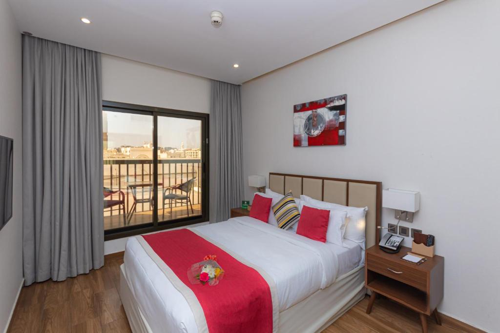 Postel nebo postele na pokoji v ubytování Le Wana Hotel