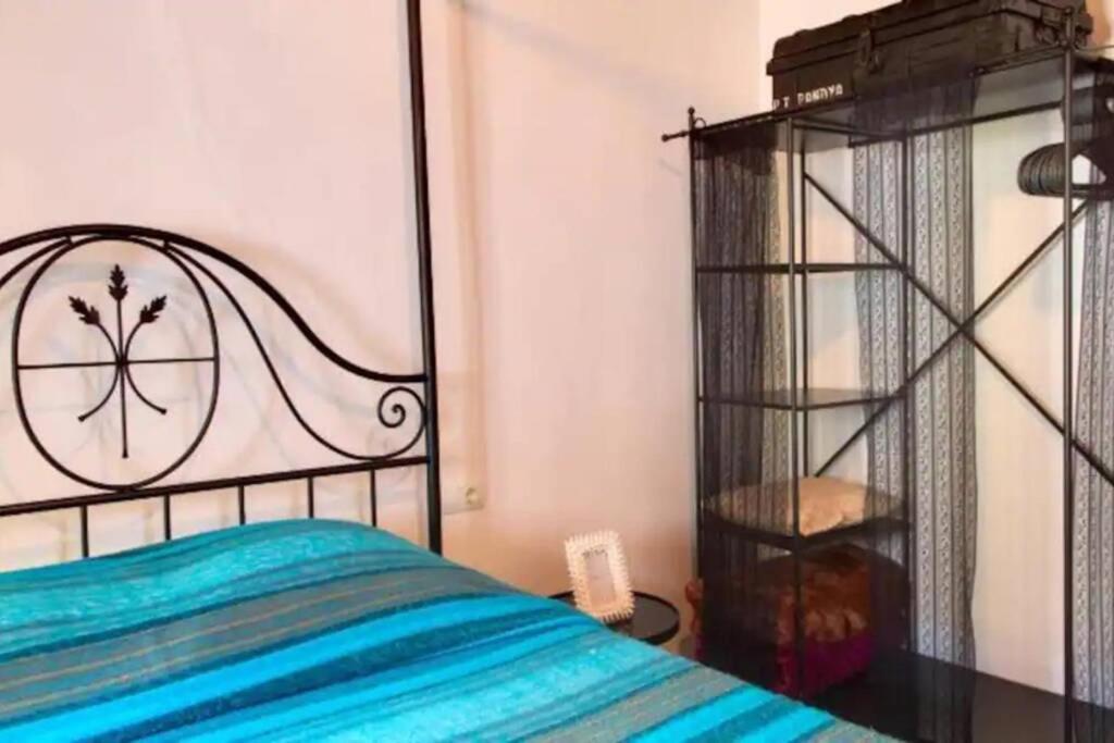 A bed or beds in a room at CASA IBICENCA EN CALA D´HORT