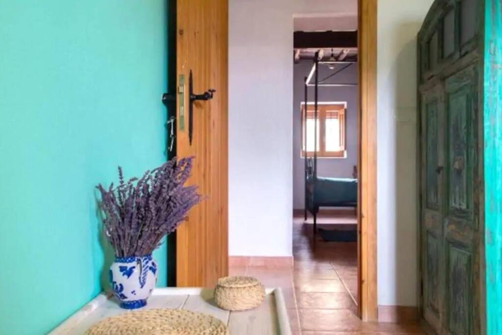 A bed or beds in a room at CASA IBICENCA EN CALA D´HORT