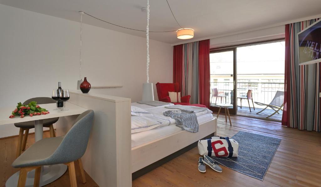 Postel nebo postele na pokoji v ubytování Frauscher Hafen-Apartments