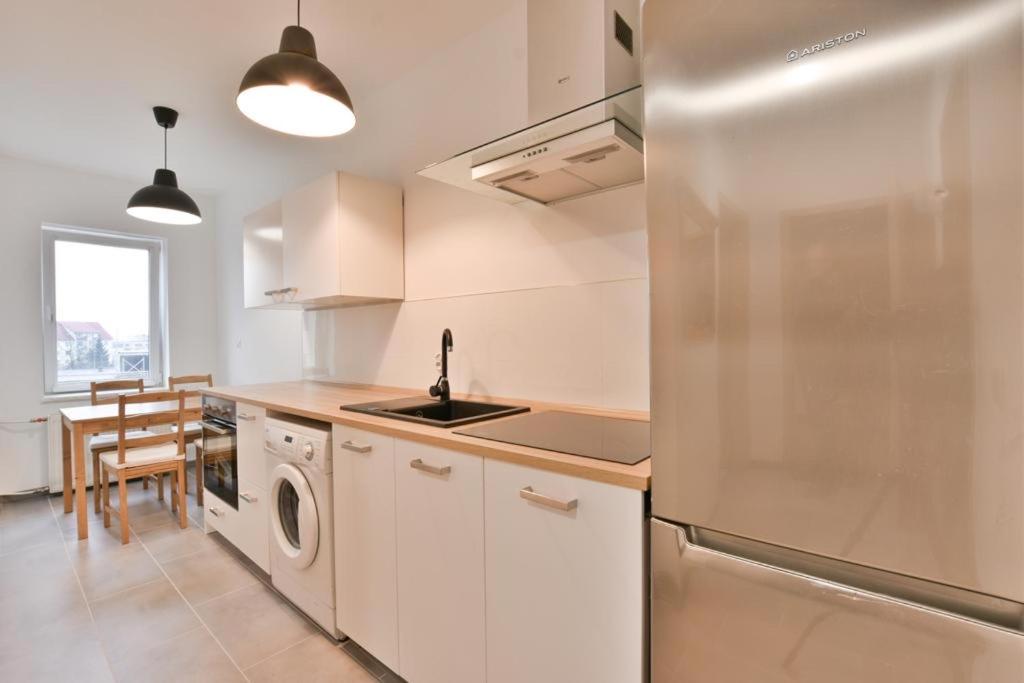 Een keuken of kitchenette bij Apartament Aleksander