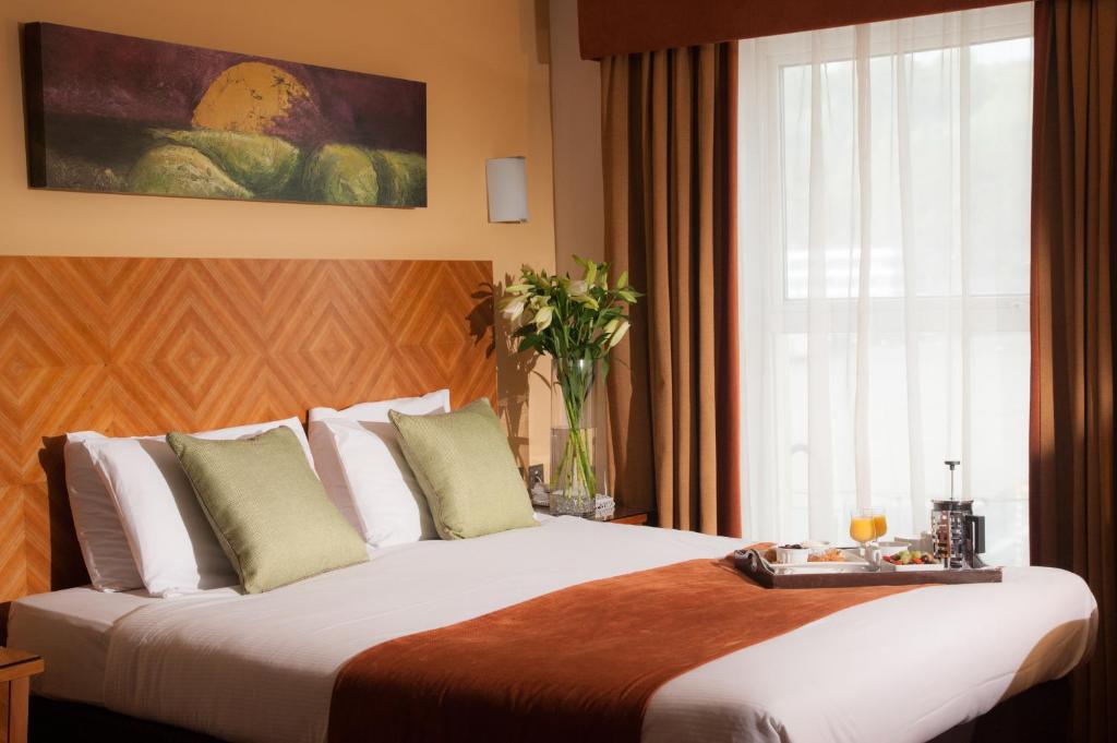 Postel nebo postele na pokoji v ubytování Treacys Hotel & Leisure Centre Waterford