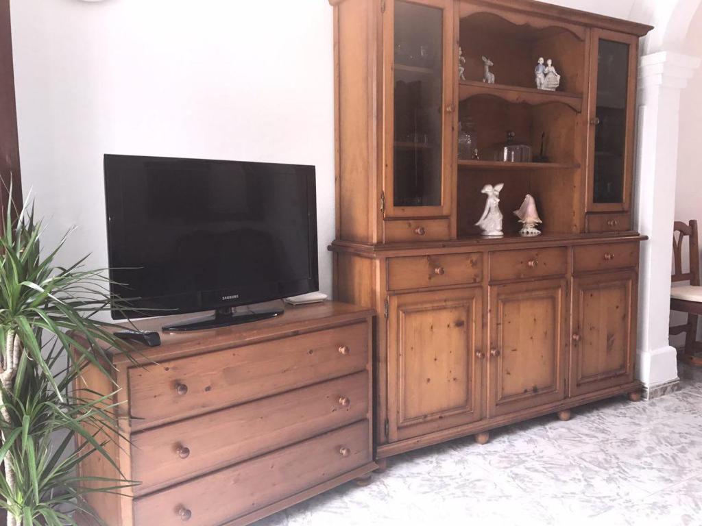 TV a/nebo společenská místnost v ubytování Cas Padrins