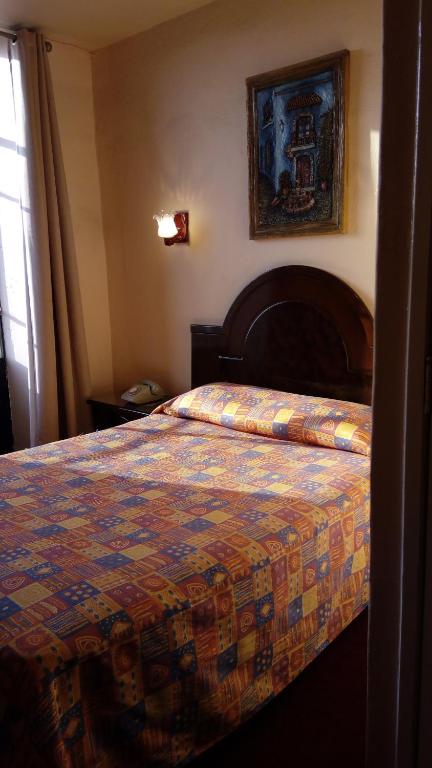 Postel nebo postele na pokoji v ubytování Hotel Gomez de Celaya