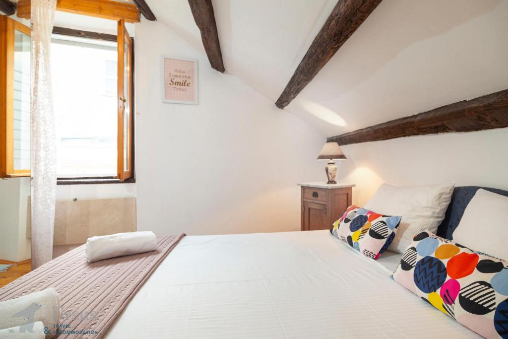 Postel nebo postele na pokoji v ubytování Apartment Lira