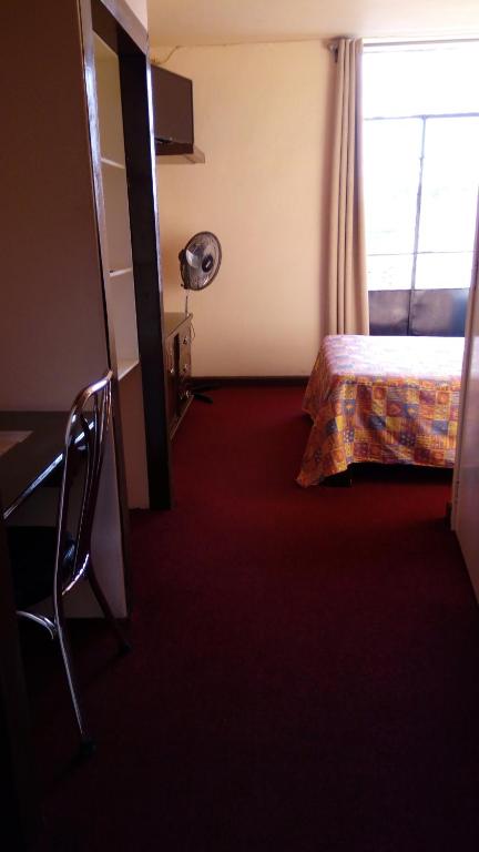Postel nebo postele na pokoji v ubytování Hotel Gomez de Celaya