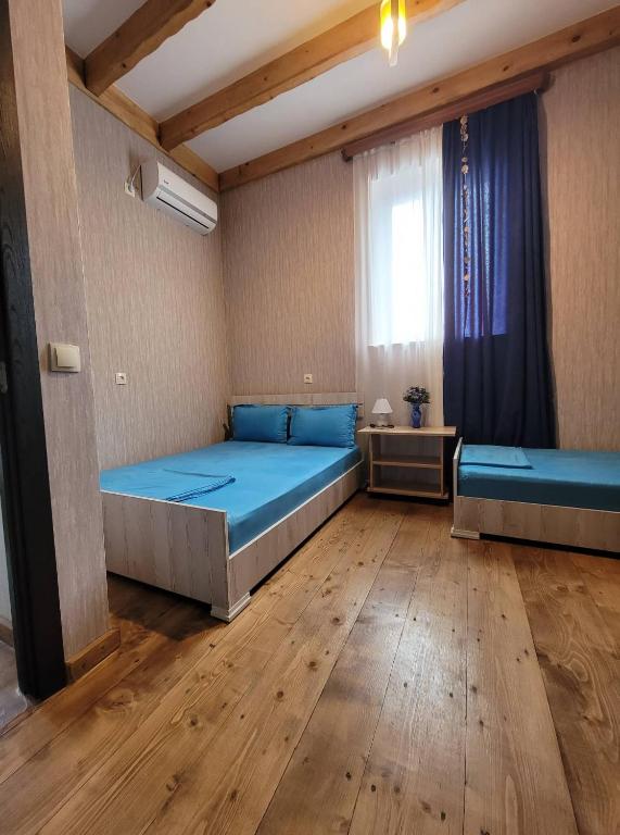 Postel nebo postele na pokoji v ubytování Golden Gate