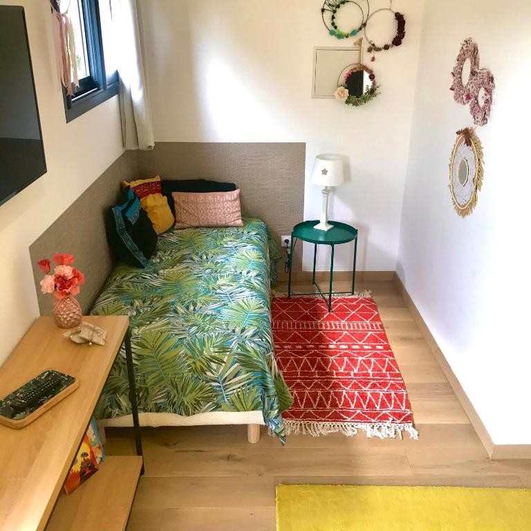 Postel nebo postele na pokoji v ubytování Atelier des Vidaux