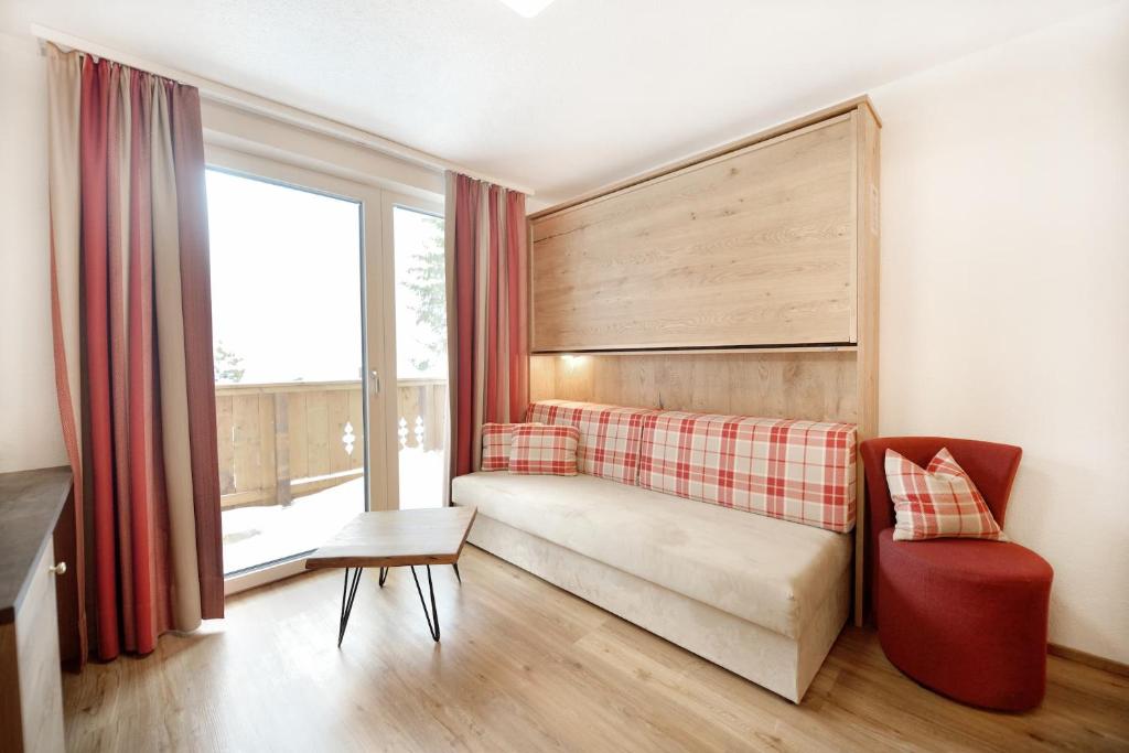 Postel nebo postele na pokoji v ubytování Hotel Alpina Superior