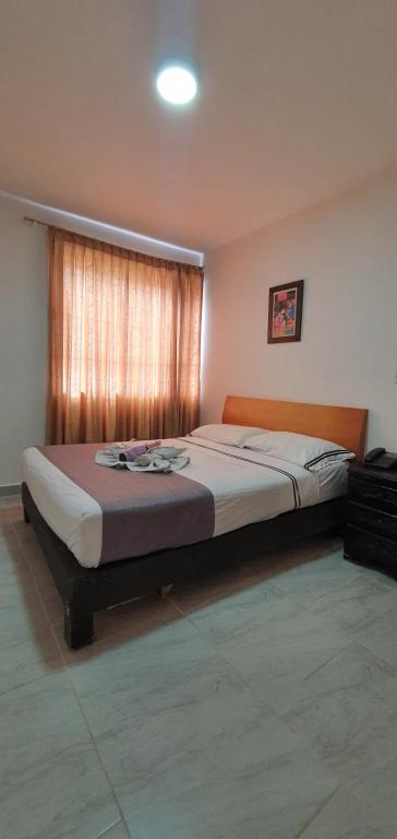 Letto o letti in una camera di Hotel Gran Imperio