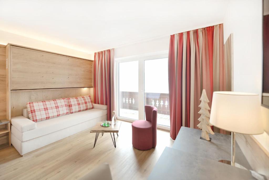 Posezení v ubytování Hotel Alpina Superior