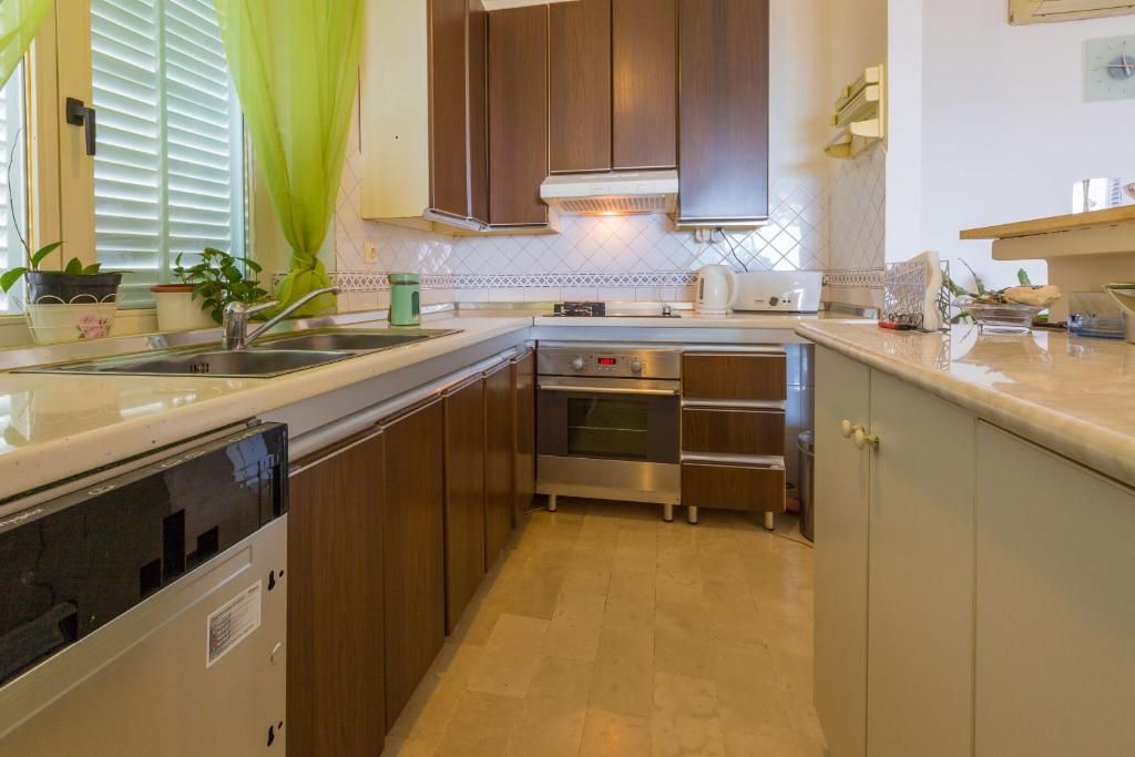 Kuchyňa alebo kuchynka v ubytovaní Apartments Dorijan i Karlo
