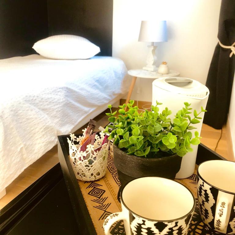 Postel nebo postele na pokoji v ubytování Atelier des Vidaux