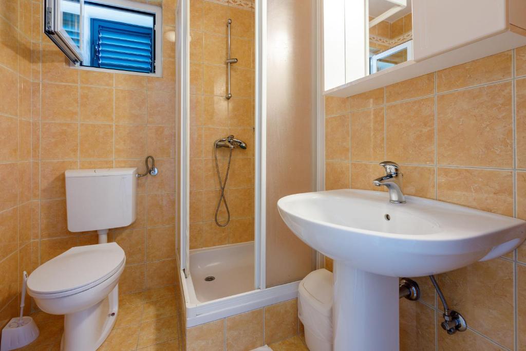 Kúpeľňa v ubytovaní Apartments Loncaric