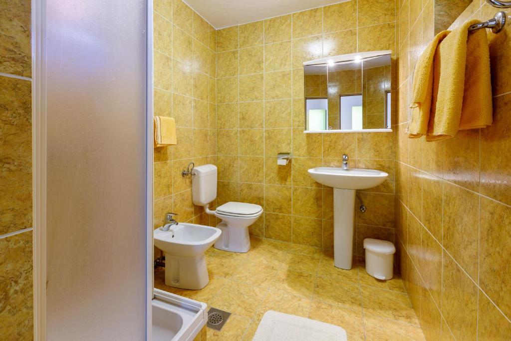 Kúpeľňa v ubytovaní Apartments Loncaric