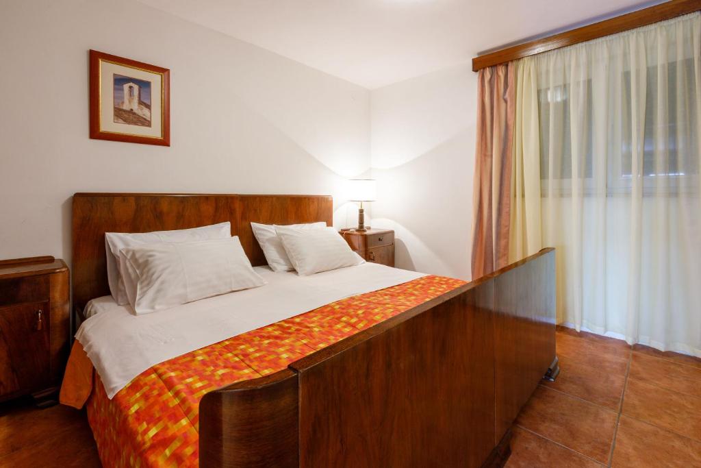 Posteľ alebo postele v izbe v ubytovaní Apartments Loncaric