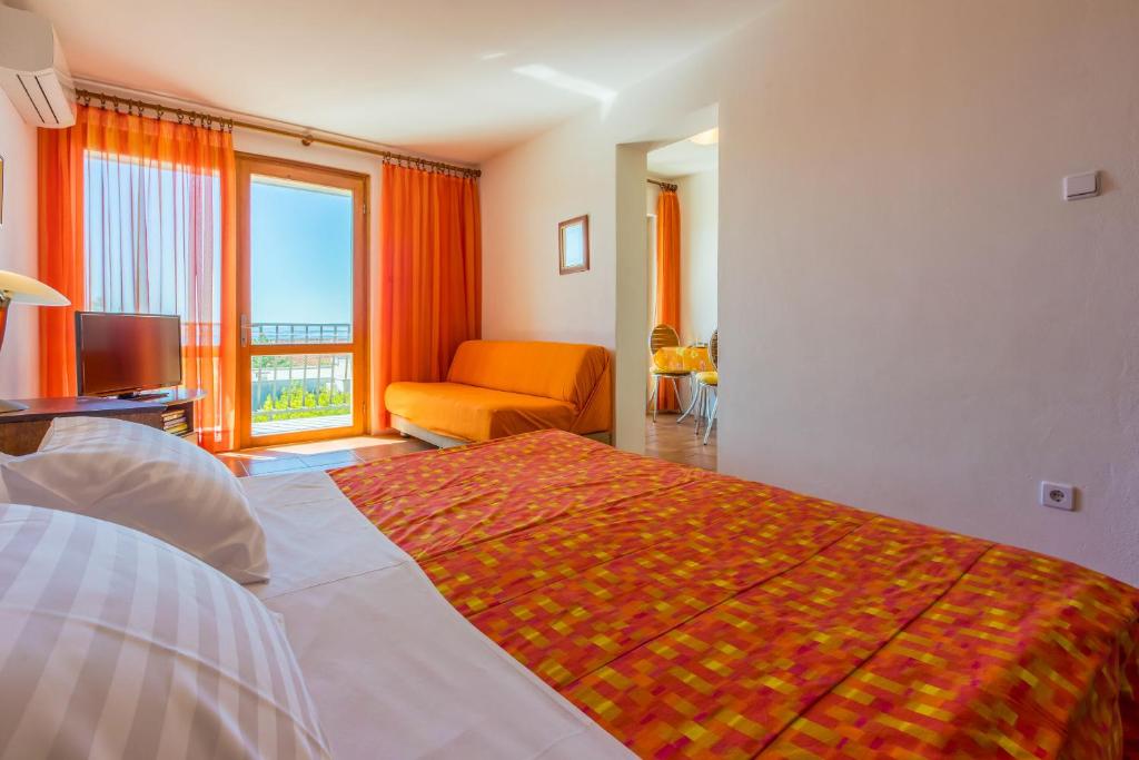 Posteľ alebo postele v izbe v ubytovaní Apartments Loncaric
