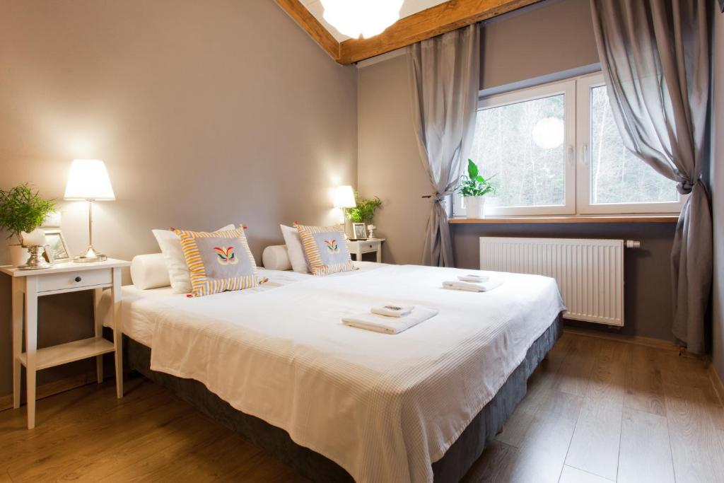 Posteľ alebo postele v izbe v ubytovaní Karolinka Guest House