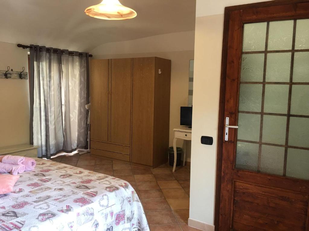 Postel nebo postele na pokoji v ubytování B&B sotto le mura