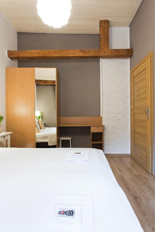 Posteľ alebo postele v izbe v ubytovaní Karolinka Guest House