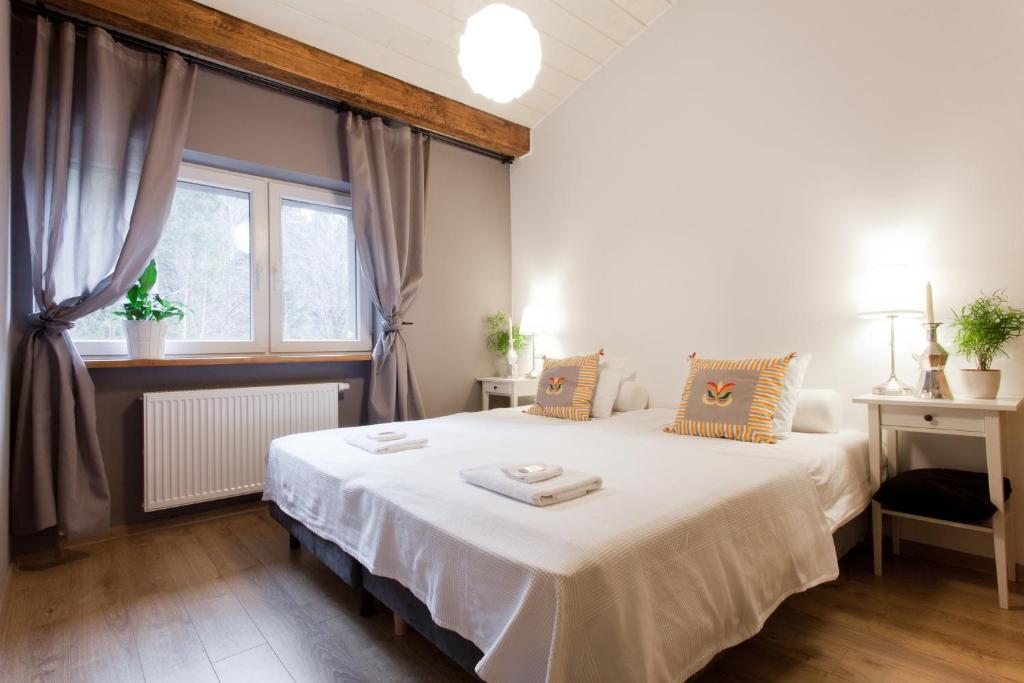 Posteľ alebo postele v izbe v ubytovaní Karolinka Guest House
