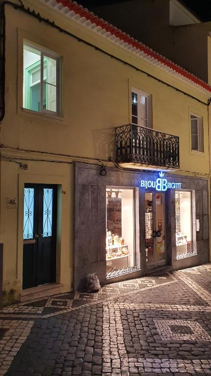 a store front of a building on a street at Bella Italia Portas da Cidade in Ponta Delgada