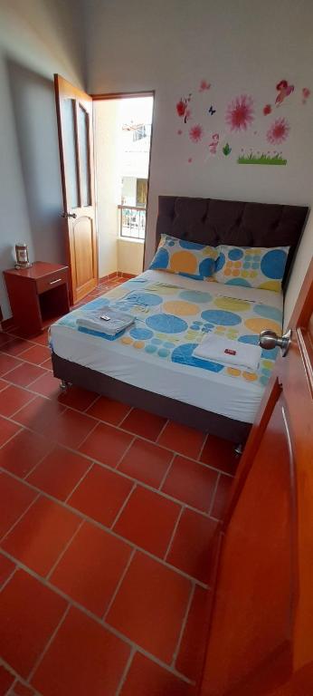 Llit o llits en una habitació de Posada San Luis