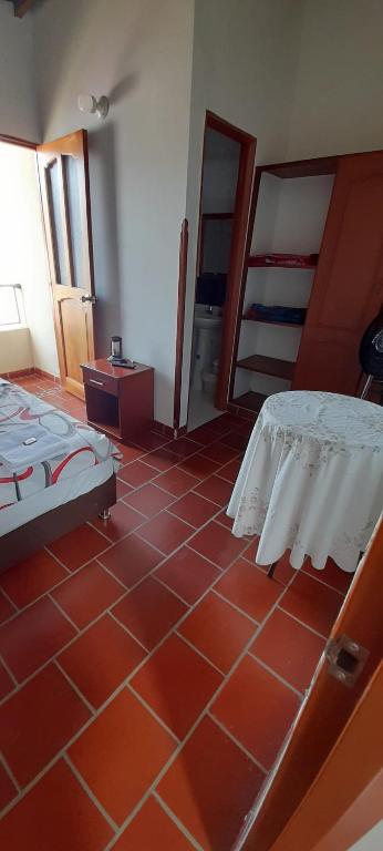 Llit o llits en una habitació de Posada San Luis