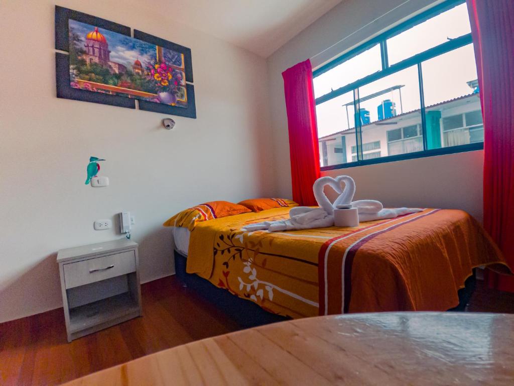 Postel nebo postele na pokoji v ubytování Residencial Marina House