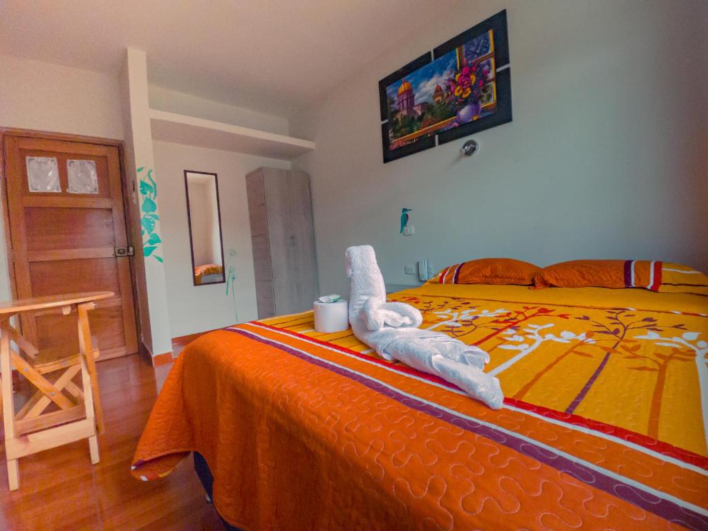 Postel nebo postele na pokoji v ubytování Residencial Marina House