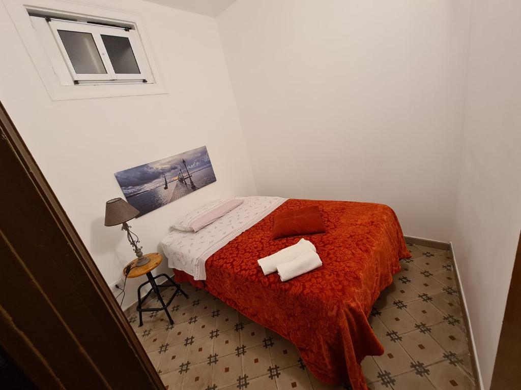 Posteľ alebo postele v izbe v ubytovaní Agorà Sant’anna Apartment