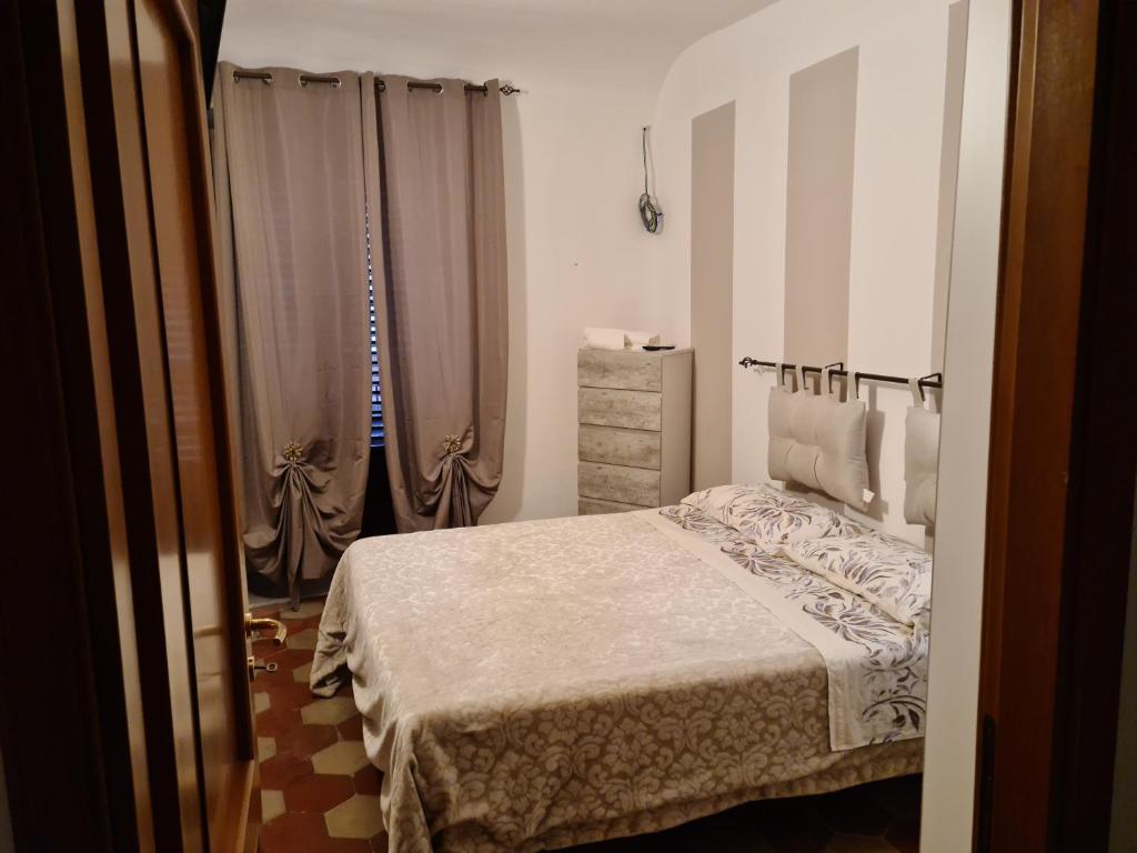 Posteľ alebo postele v izbe v ubytovaní Agorà Sant’anna Apartment