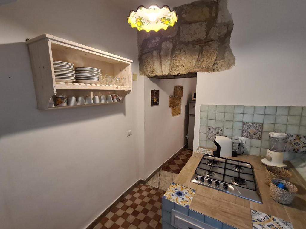 Kuchyňa alebo kuchynka v ubytovaní Agorà Sant’anna Apartment