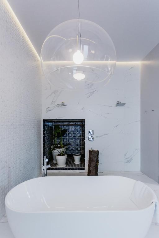 TV a/nebo společenská místnost v ubytování Tá Hotel de diseño