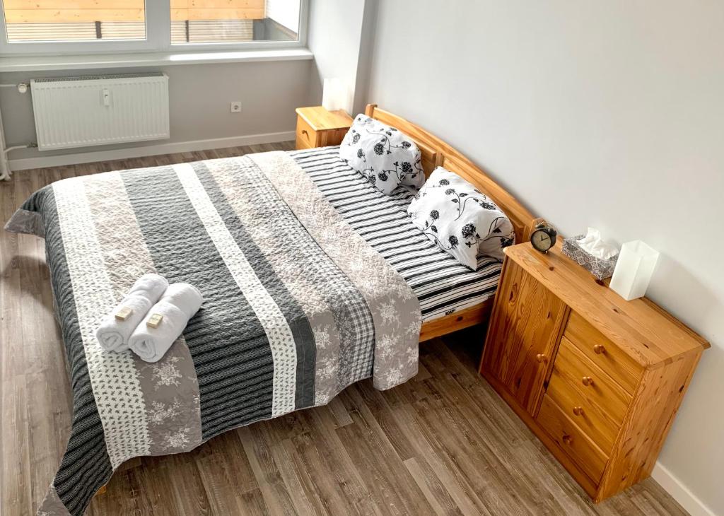 Posteľ alebo postele v izbe v ubytovaní K1 Panoramic apartment