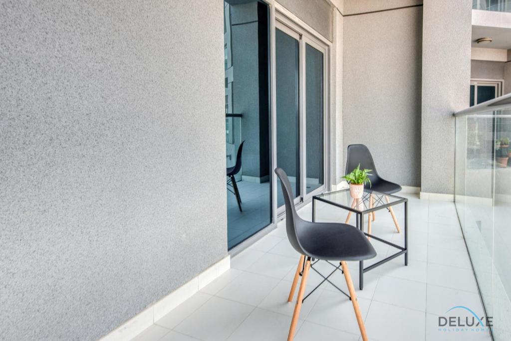 Balkón nebo terasa v ubytování Snug 1BR at MAG 520 Dubai South by Deluxe Holiday Homes