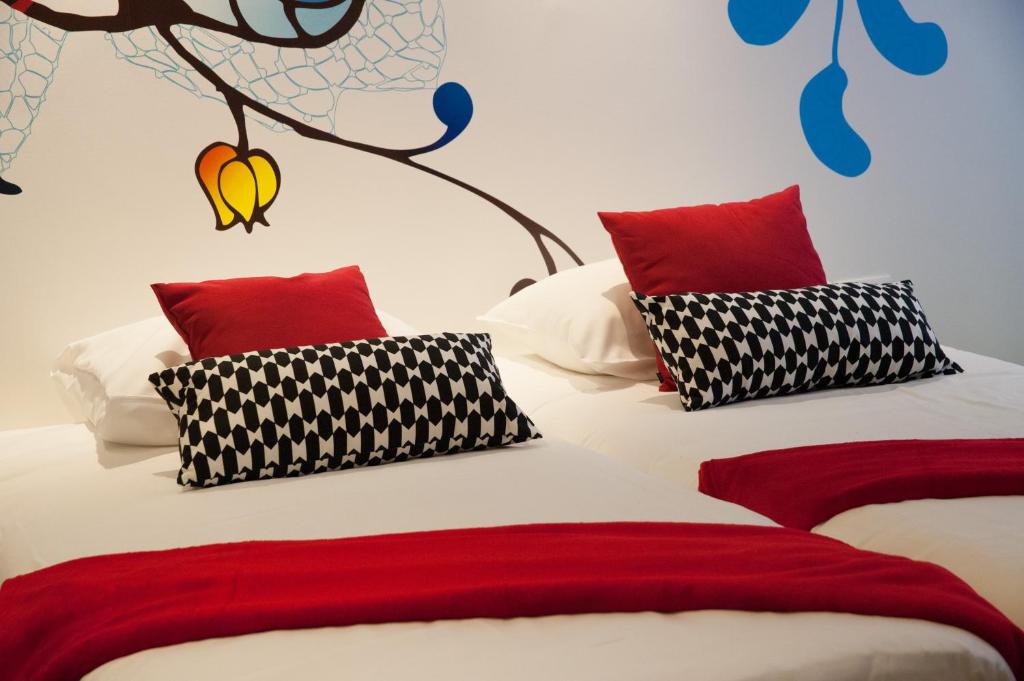 Postel nebo postele na pokoji v ubytování Appart'hotel Urban Lodge