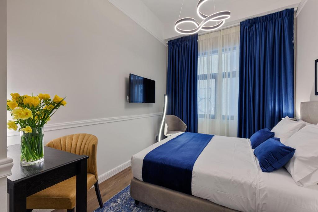 Posteľ alebo postele v izbe v ubytovaní Classic Hotel by Athens Prime Hotels