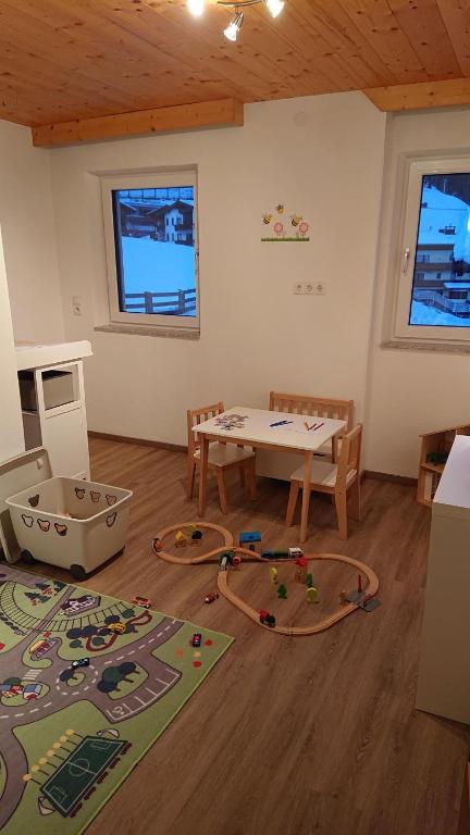 TV a/nebo společenská místnost v ubytování Hoamatl, Appartement